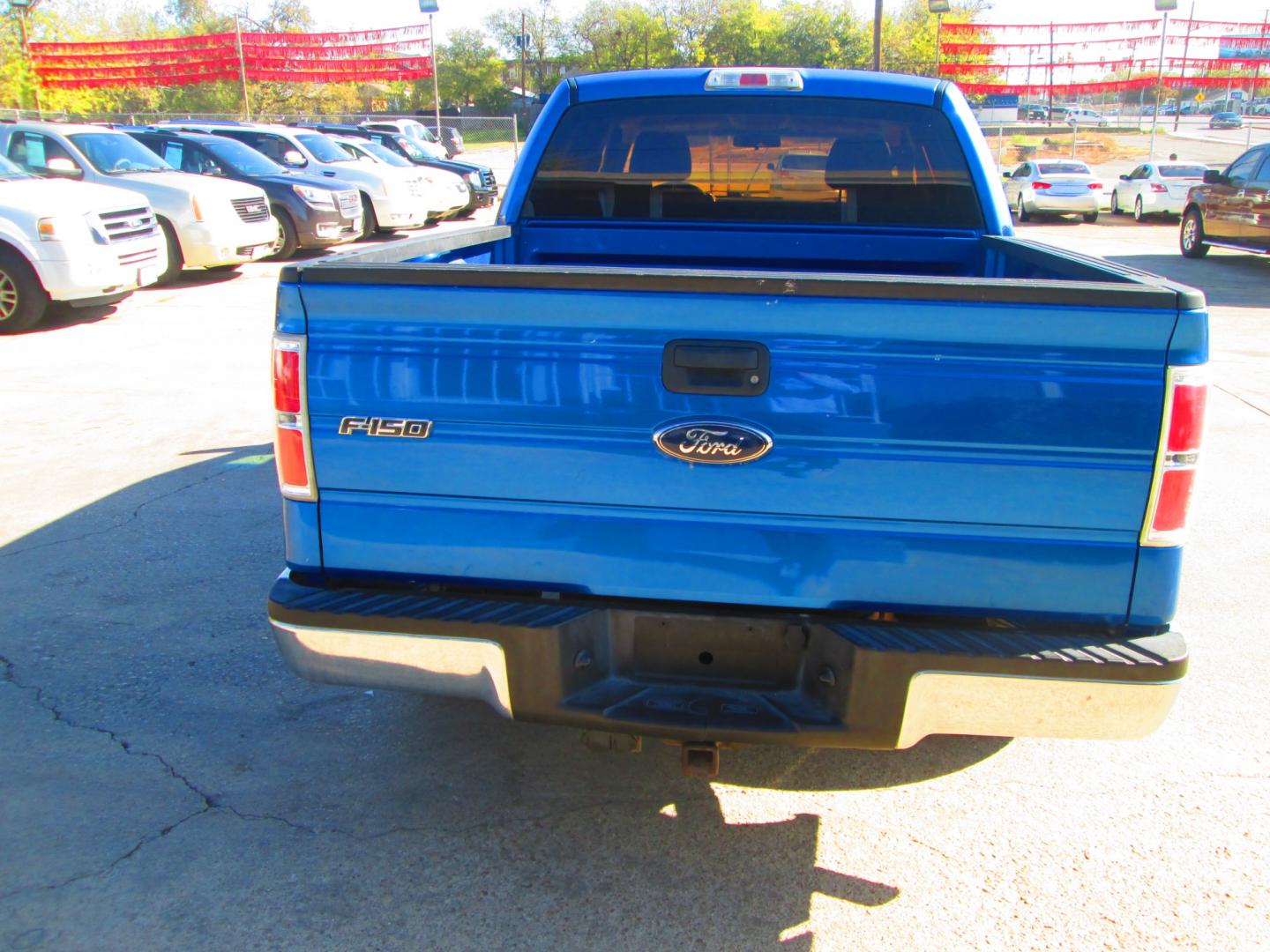 2009 BLUE Ford F-150 (1FTRW12W09F) with an 4.6L V8 OHC FFV engine, 4-Speed Automatic transmission, located at 1815 NE 28th St., Fort Worth, TX, 76106, (817) 625-6251, 32.795582, -97.333069 - Photo#5